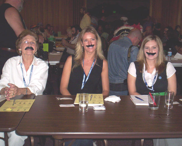 The beautiful lady judges grew facial hair for the event